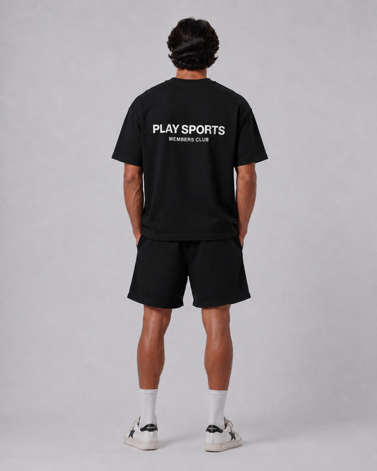 Members Club T-Shirt in black worn oversized, front view